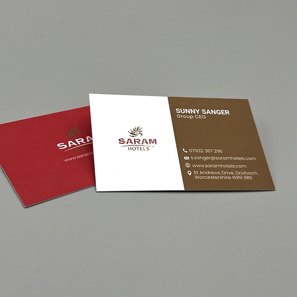 Spot UV business cards with selective gloss coating to highlight logos and key design elements.