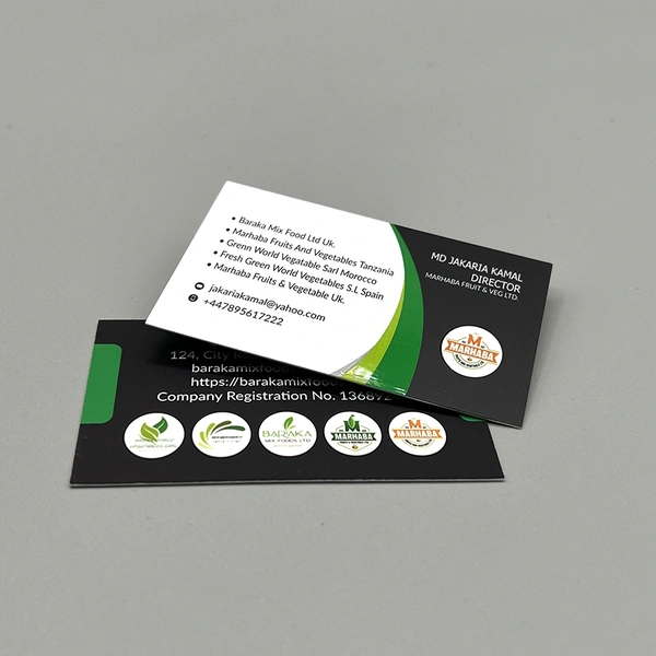 Spot UV business cards with selective gloss coating to highlight logos and key design elements.