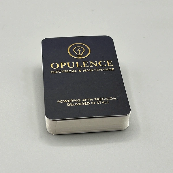 Gold foil blocked business cards featuring a premium metallic finish for a luxury, high-end appearance.