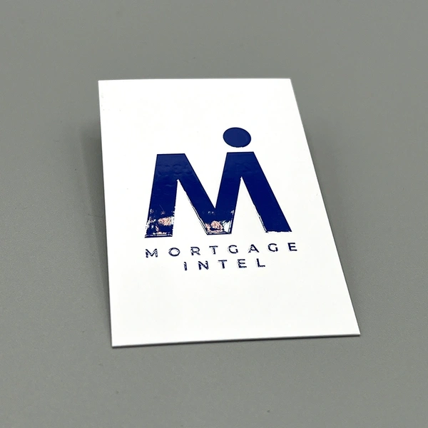 Spot UV business cards with selective gloss coating to highlight logos and key design elements.