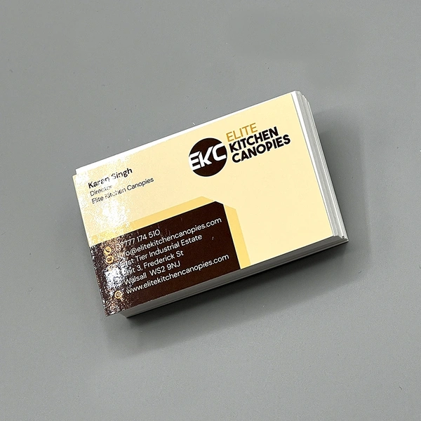 Gloss laminated business cards printed on premium card stock with a smooth, high-shine finish.